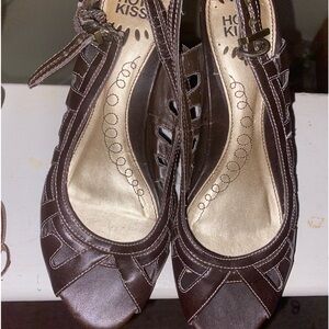 Chocolate brown open toe shoes.
